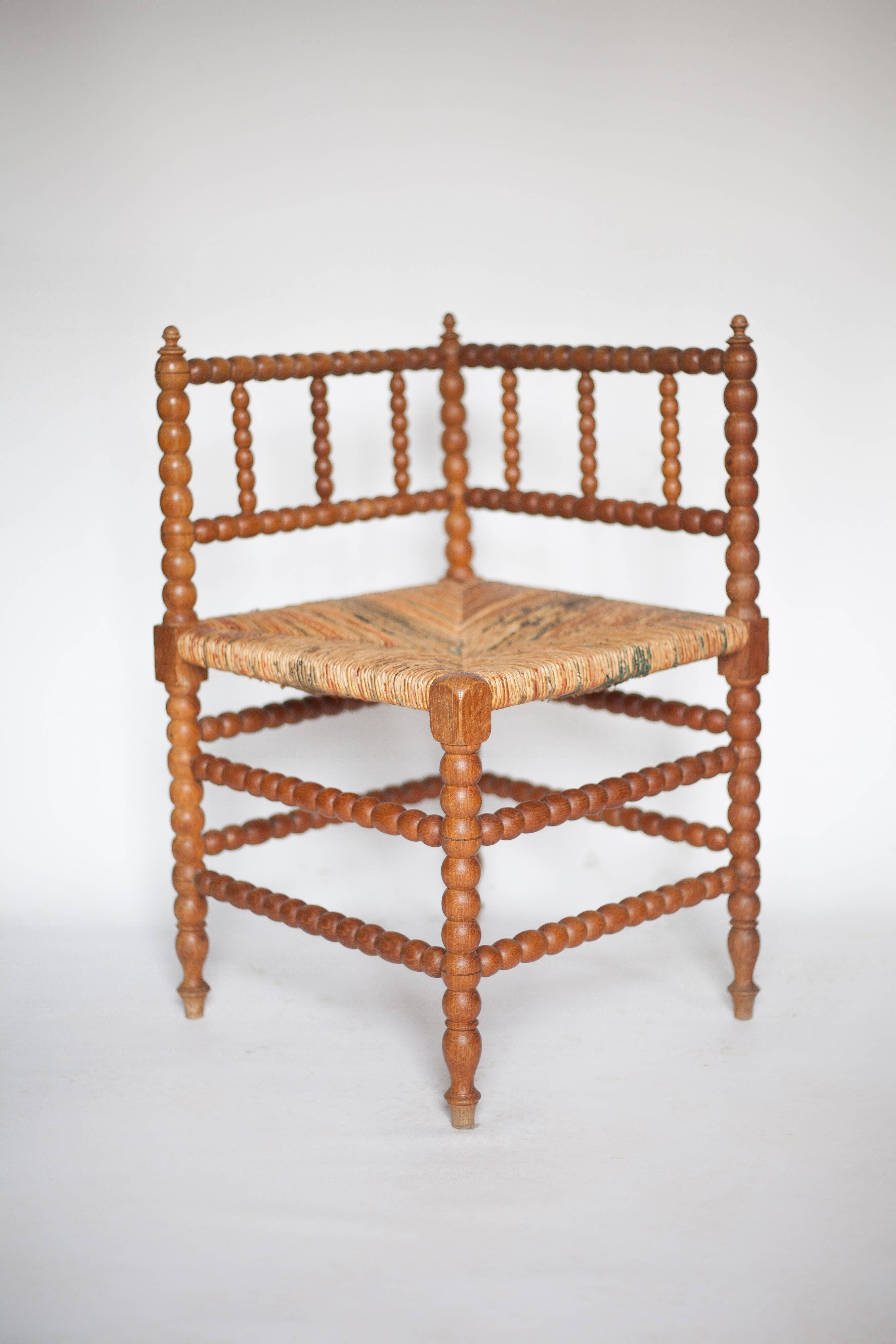 Wooden and caned corner chair, antique bobbin chair, occasional chair.