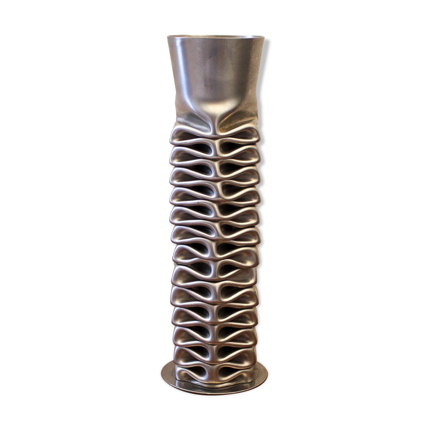 Vase en acier inoxydable compressé