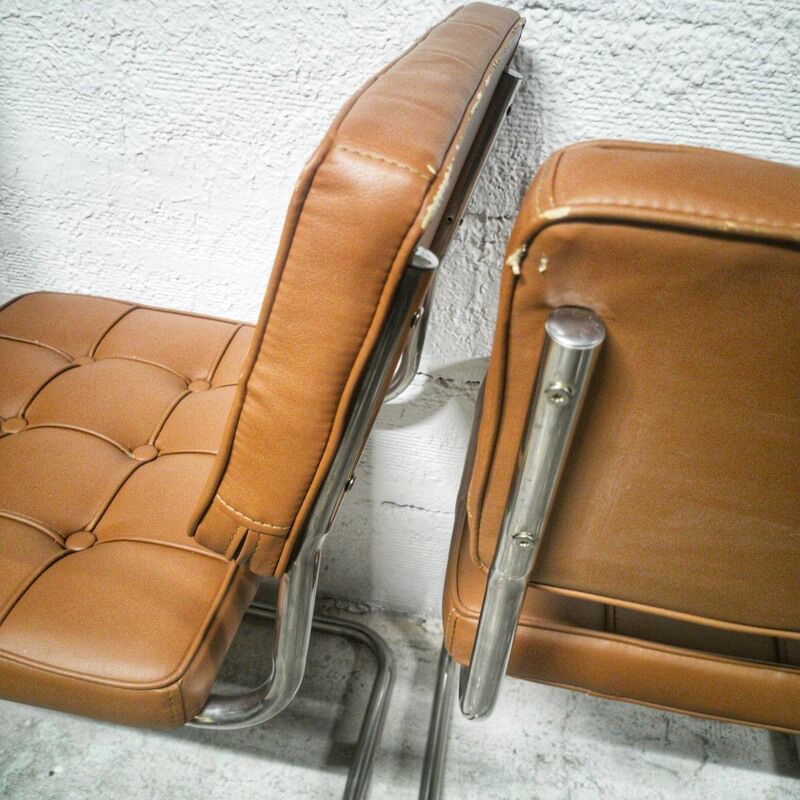 Pair of cantilever chrome and skaï chairs