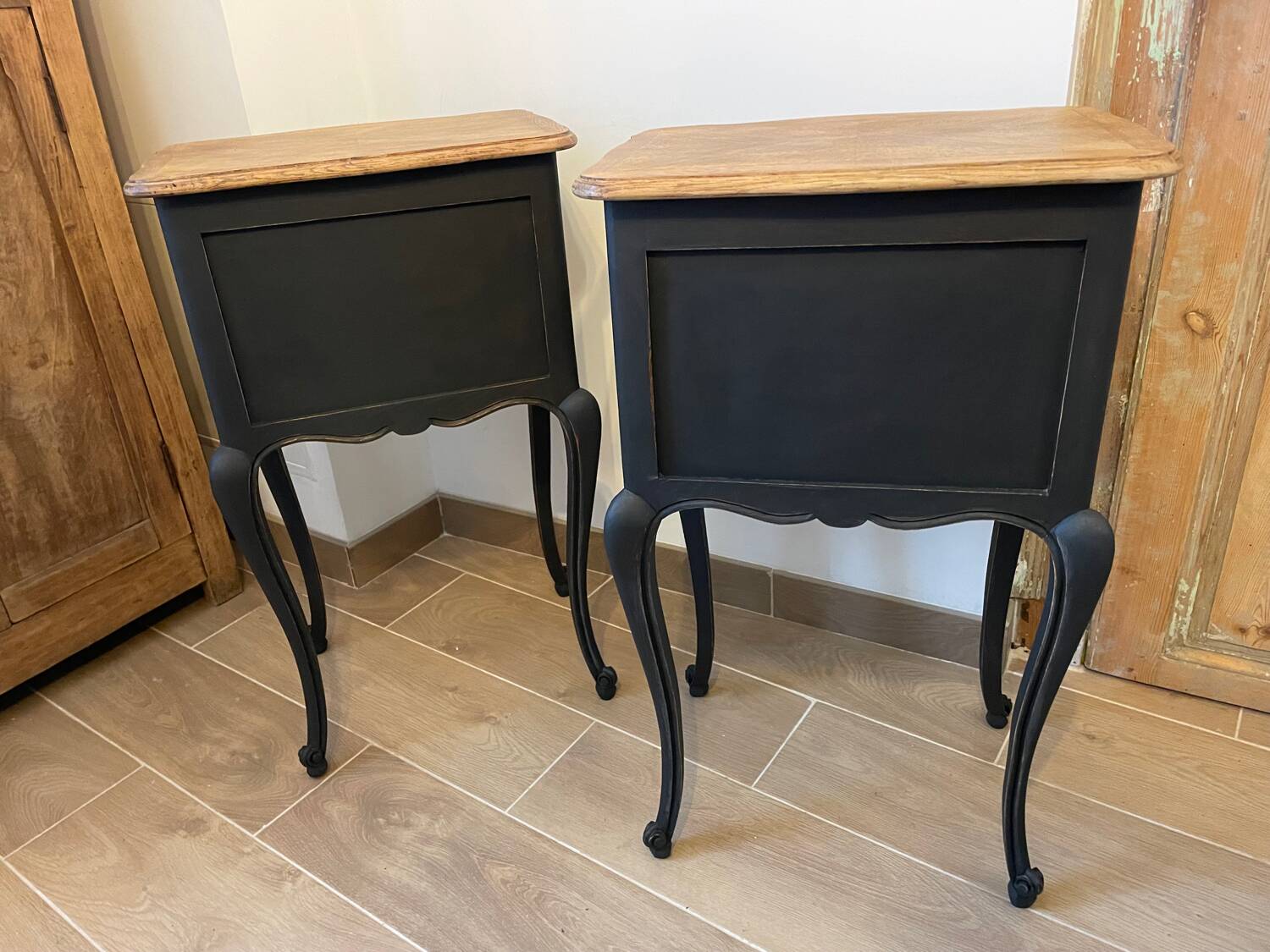 Pair of Louis XV style bedside tables with matt black patina