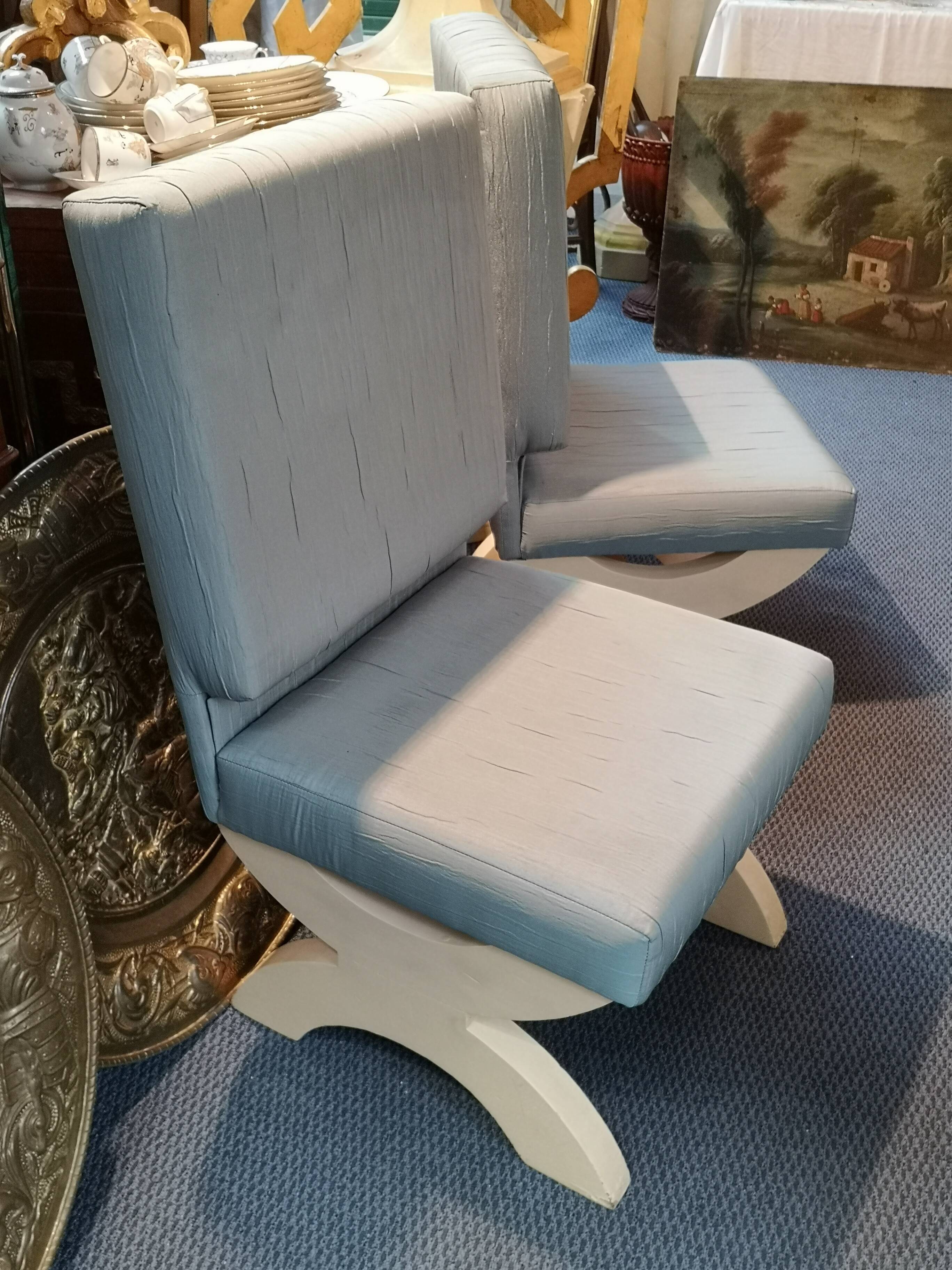 Pair of minimalist white and blue armchairs