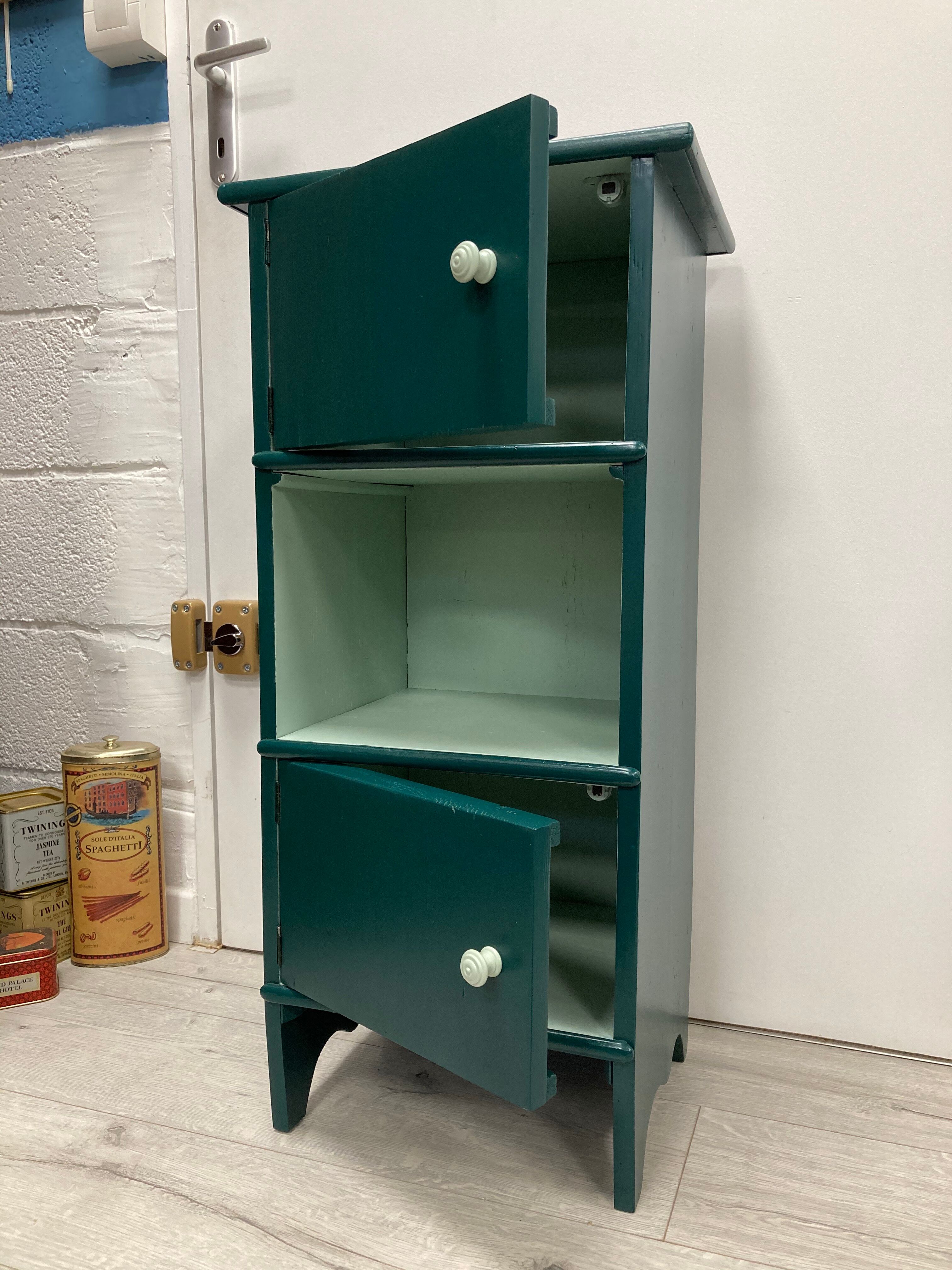 Two-door green bedside table