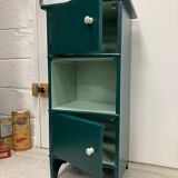 Two-door green bedside table