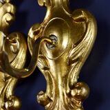 Pair of walled carved wood wall lamps