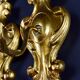 Pair of walled carved wood wall lamps