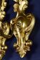 Pair of walled carved wood wall lamps