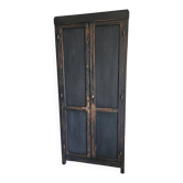 Old Parisian school wardrobe in black oak wood.