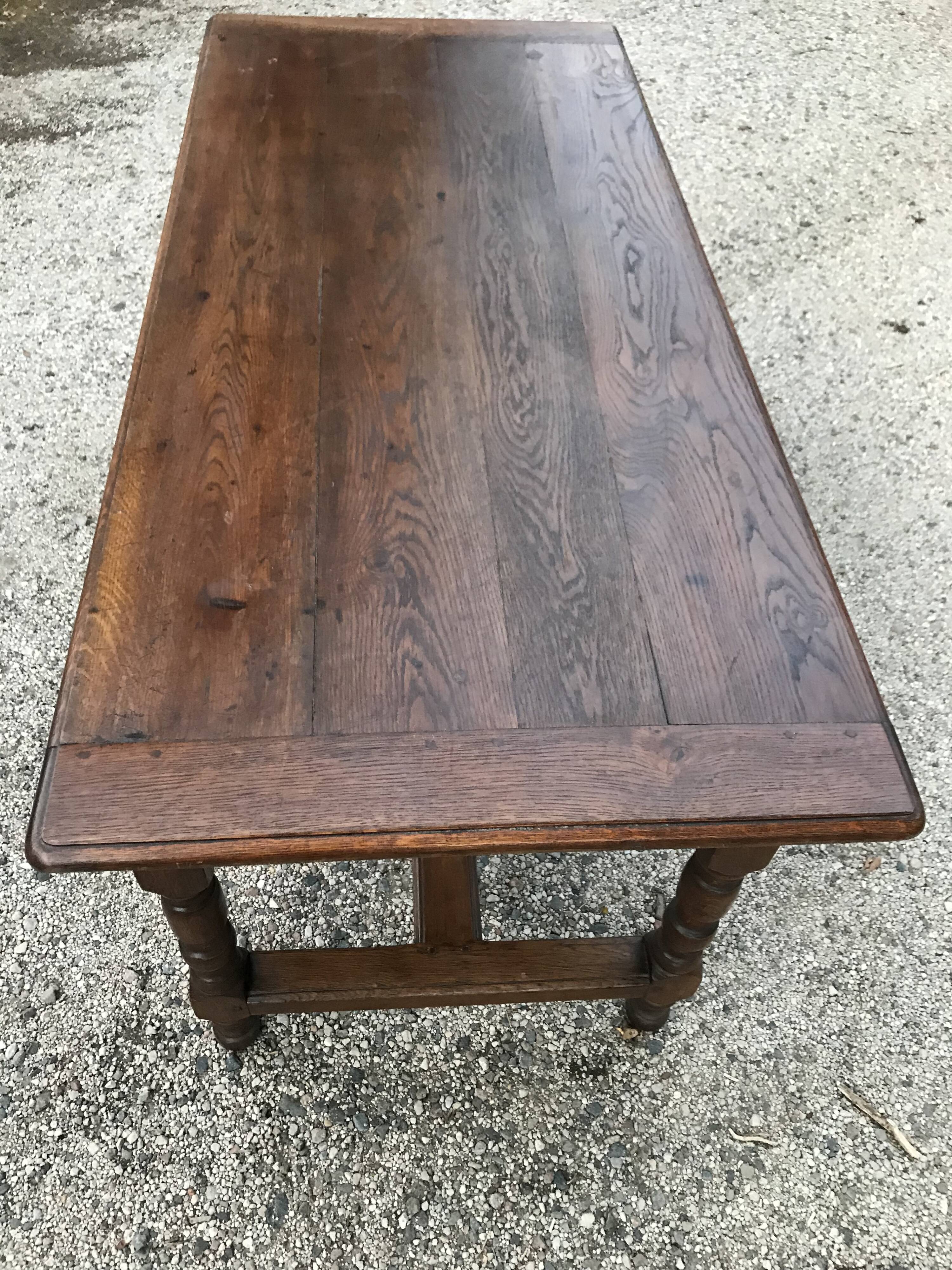 Croat farm table with a sliding tray
