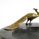 Beautiful, large black granite valet tray featuring a brass peacock, circa