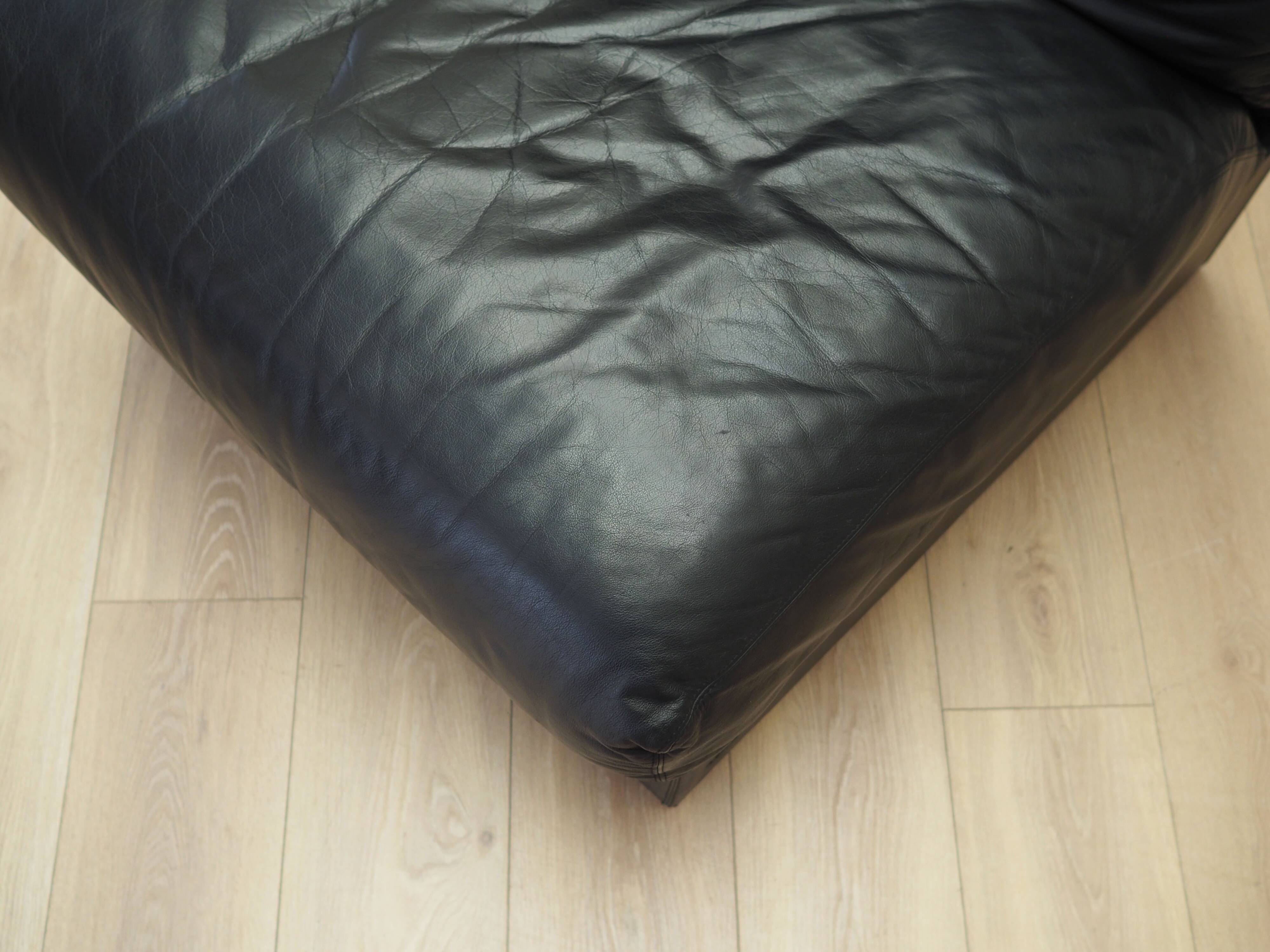 Black leather pouffe/armchair, Italian design, 1960s, production: Italy