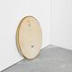 Oval mirror with gilded wood from the 1960s.