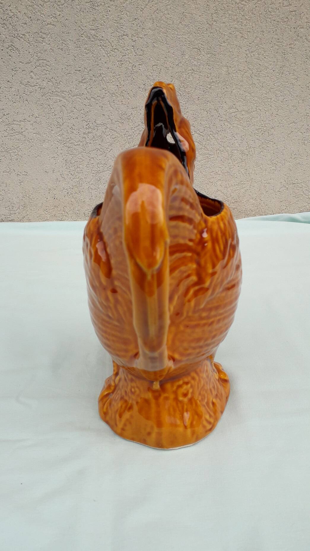Rooster pitcher