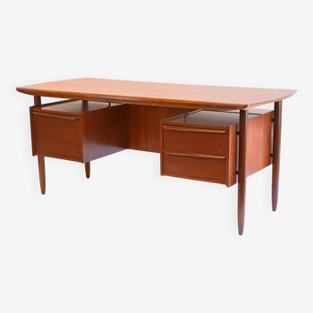 Cowhorn teak desk (Tijsseling Nijkerk)