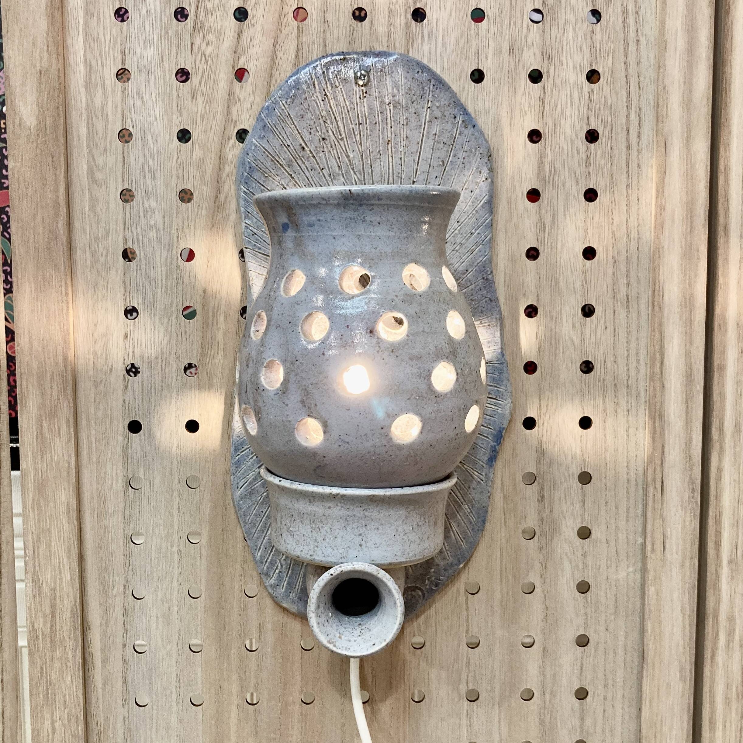 Pair of enamelled terracotta wall lights 1960.