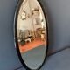 Old oval mirror 30s black wood