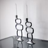 Pair of circle candlesticks by matthew hilton, england, 1980