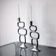 Pair of circle candlesticks by matthew hilton, england, 1980