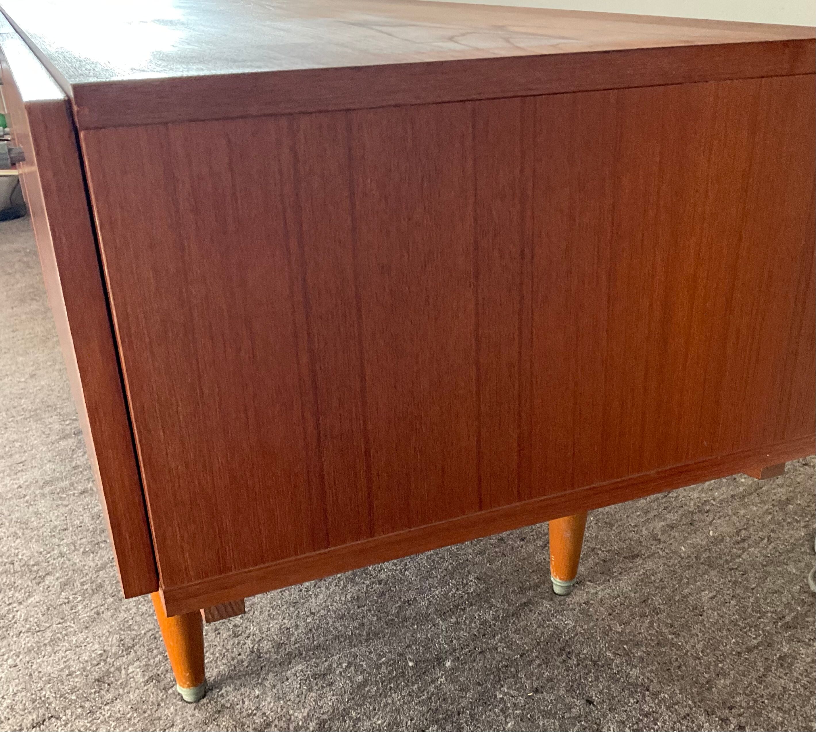 Scandinavian teak row from the 60s and 70s