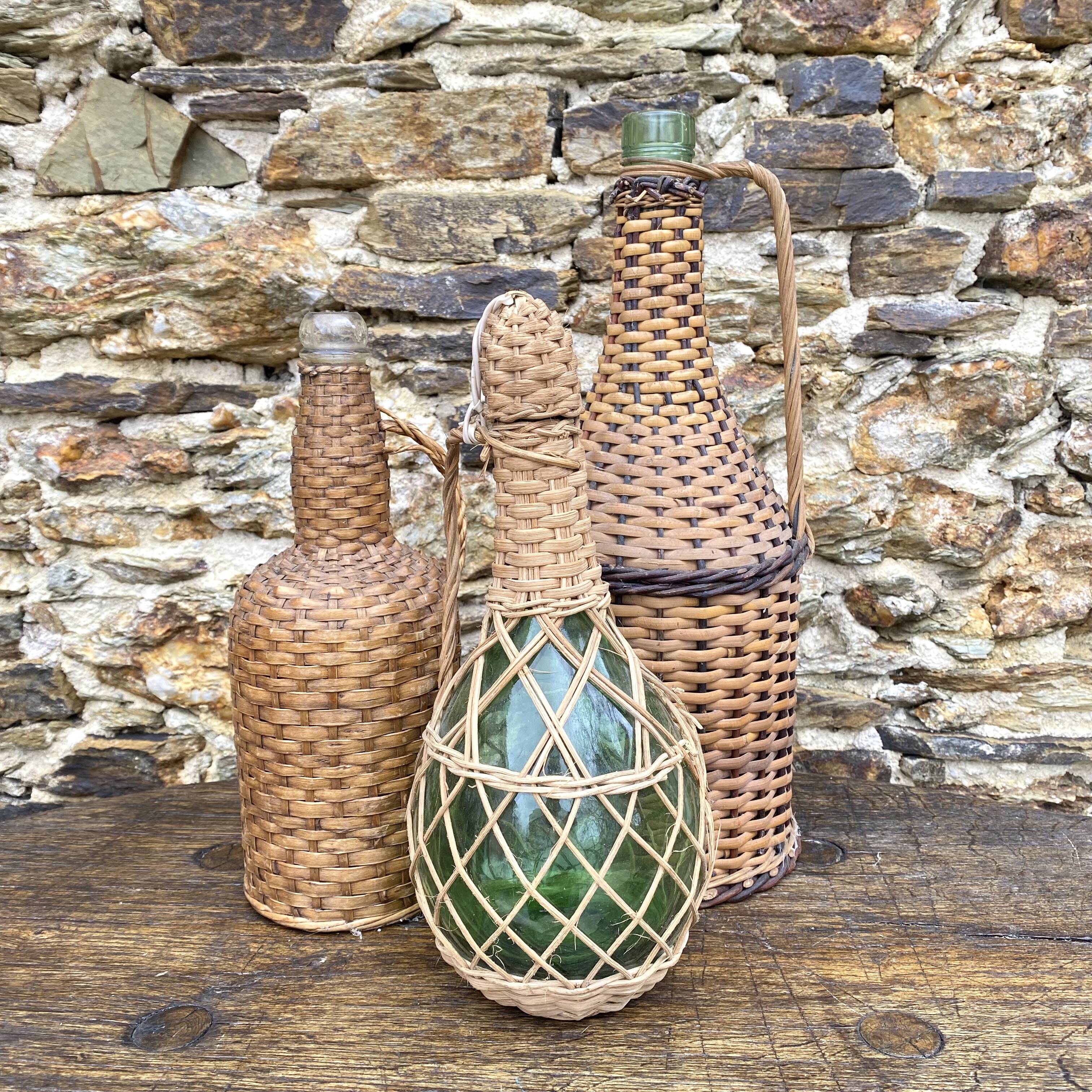 Glass bottles and rattan, woven wicker