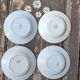 Set of four hollow plates iron earth