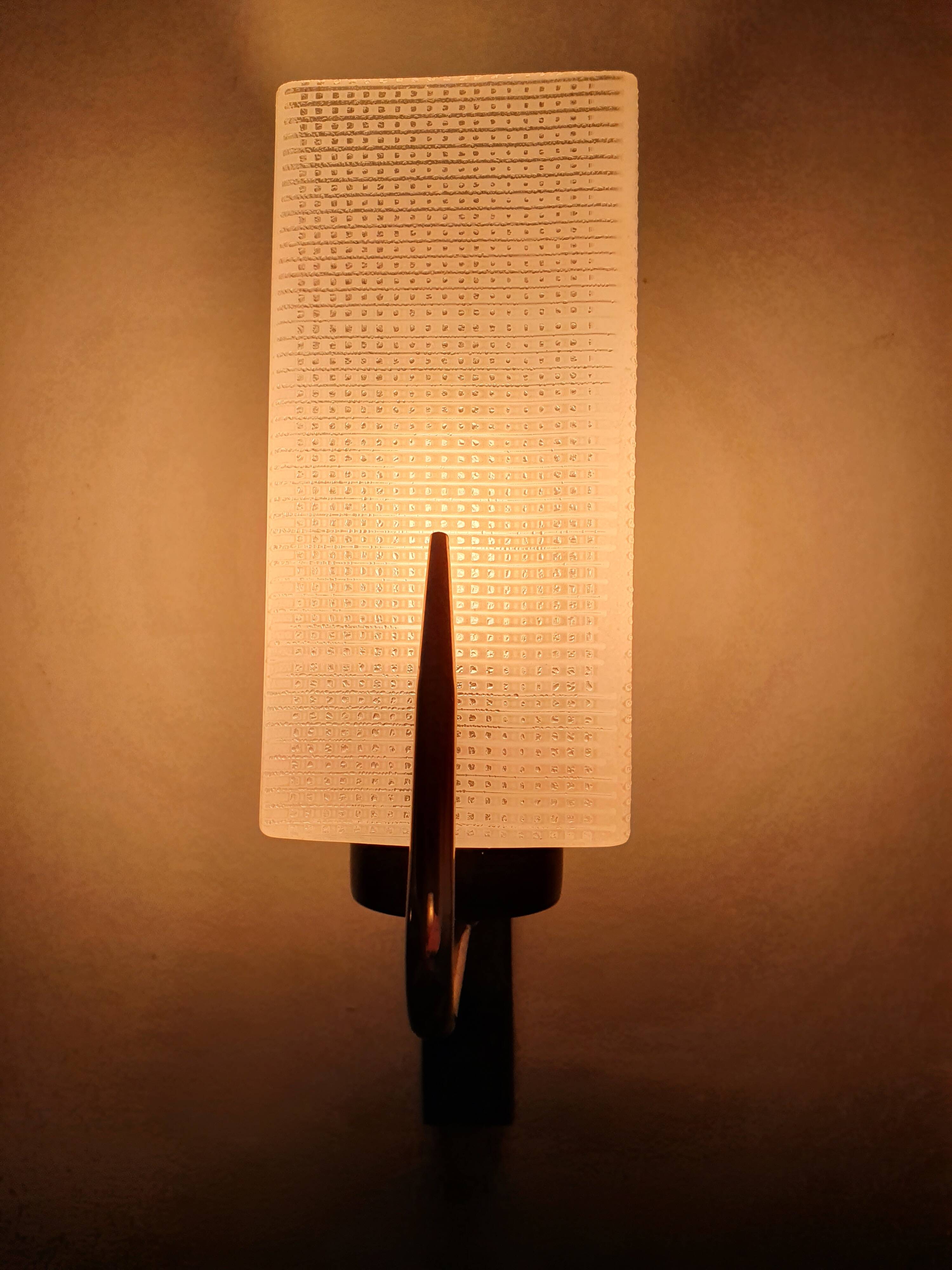 Three antique gold Arlus wall lights from the 50s