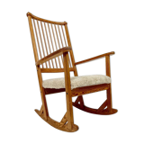 Mid-century rocking chair in pine and sheepskin by Yngve Ekström, Sweden.
