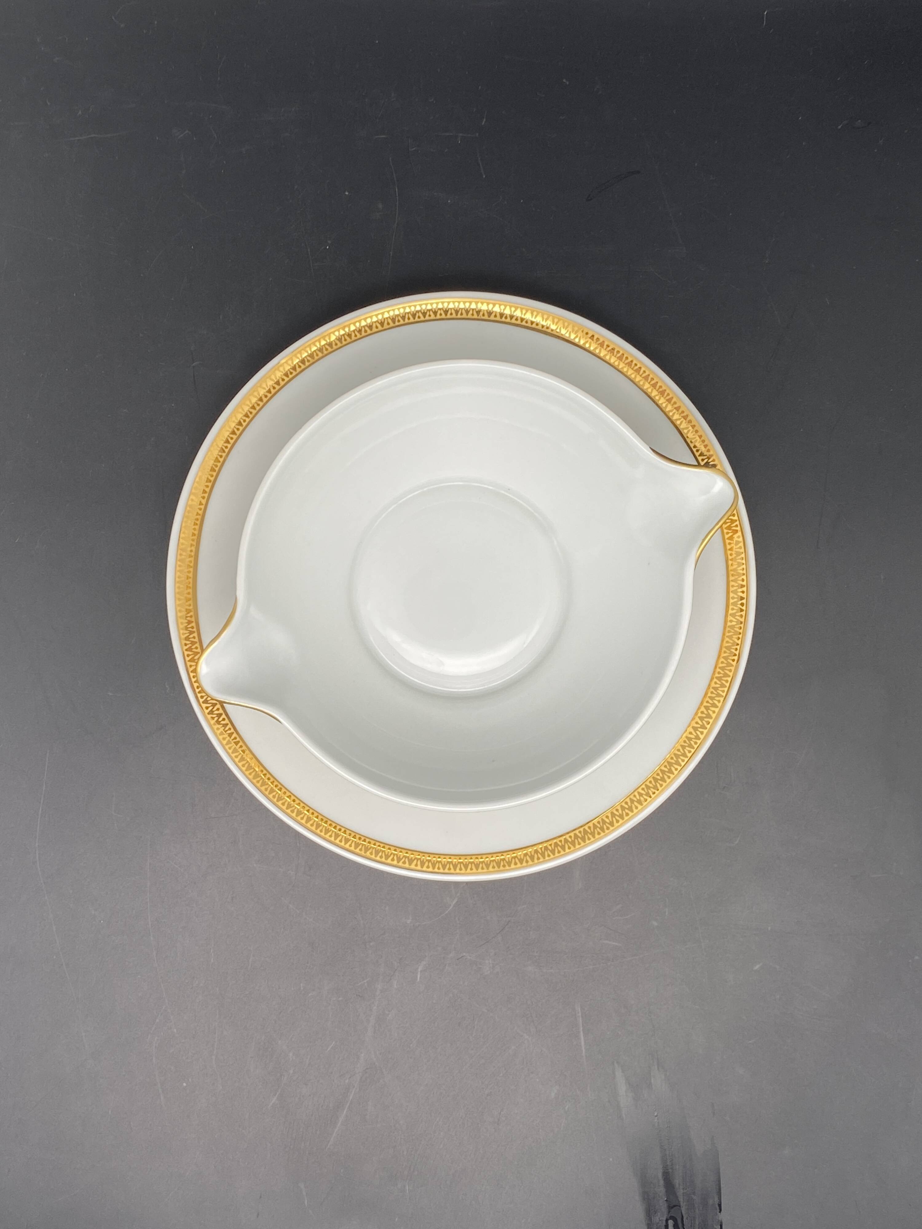 Limoges porcelain gravy boat with gold edging