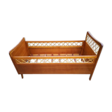 Wooden and rattan child bed