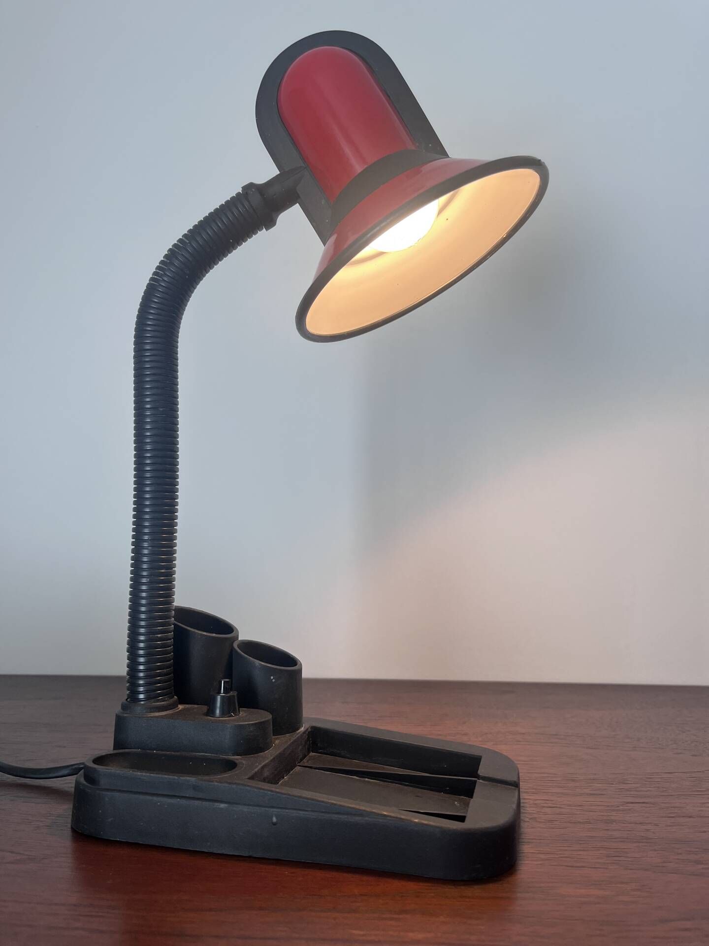 Red phase desk lamp