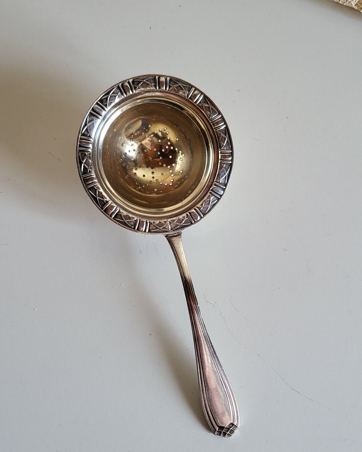 Silver-plated tea strainer