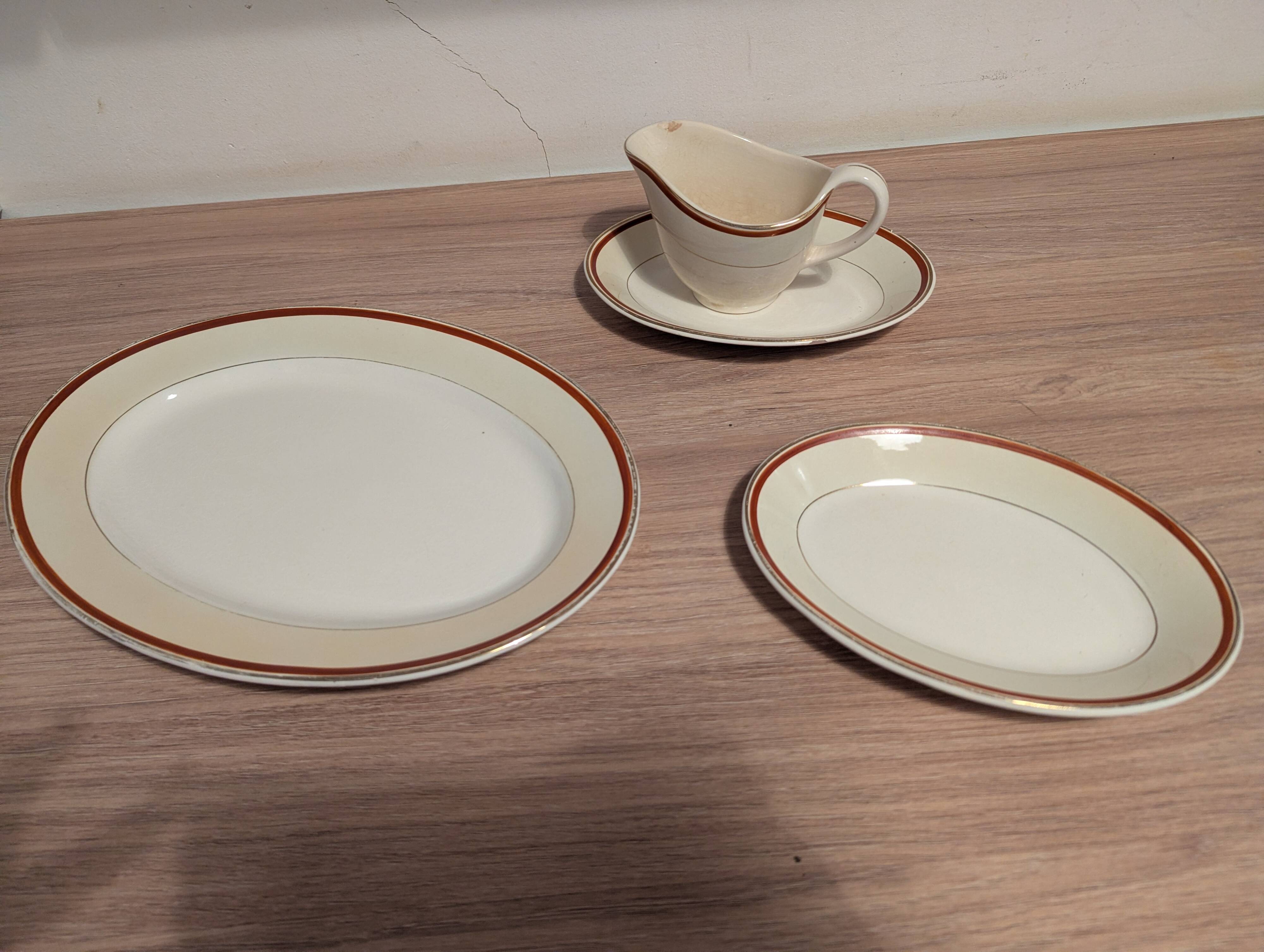Large Longchamp set in France in earthenware Tea service, serving pieces