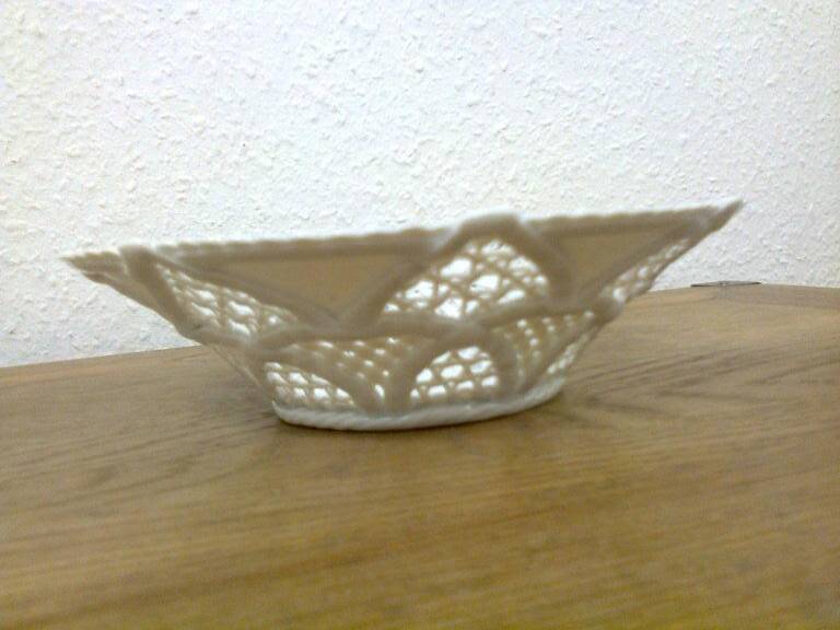 flared bowl white porcelain, lace-style openwork border