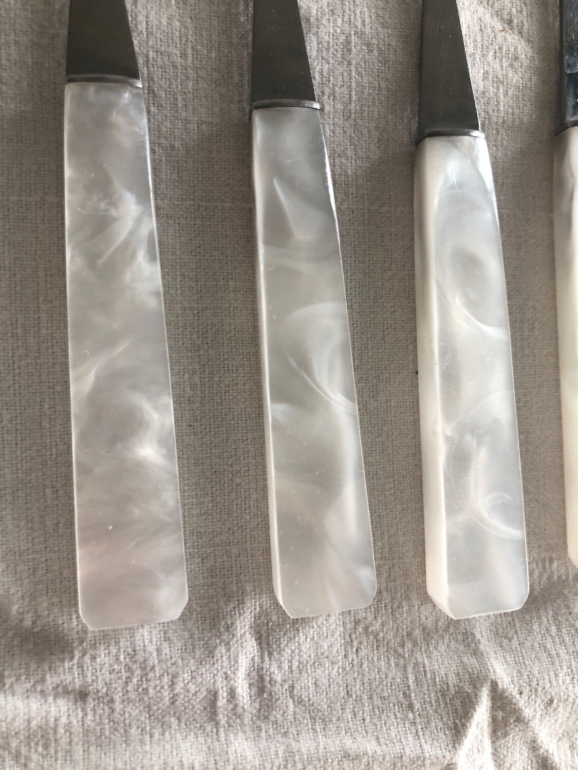 12 fourchettes à dessert manche plastique nacré blanc