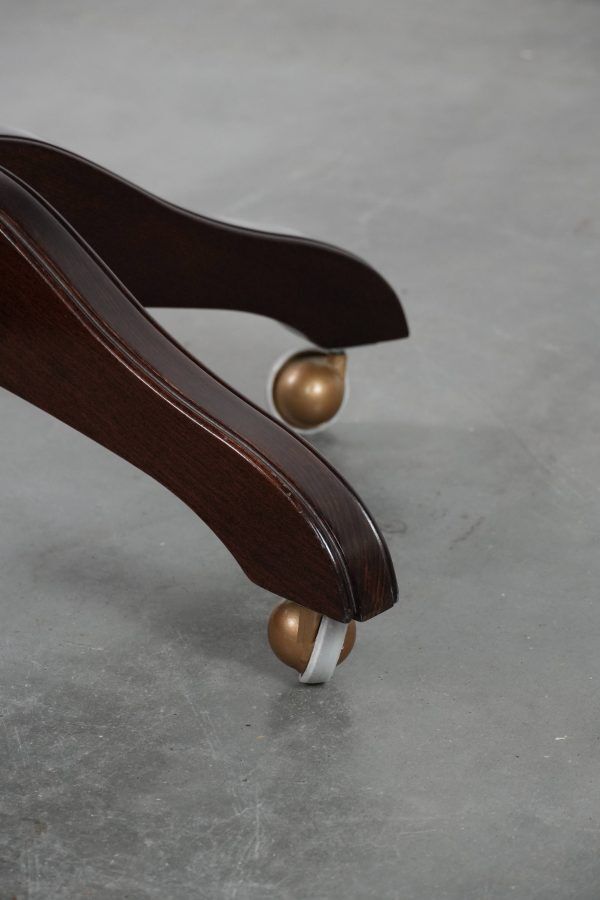 Adjustable black timeless Chesterfield office chair made of cow leather