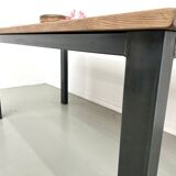 Solid oak dining table from the 70s with metal legs