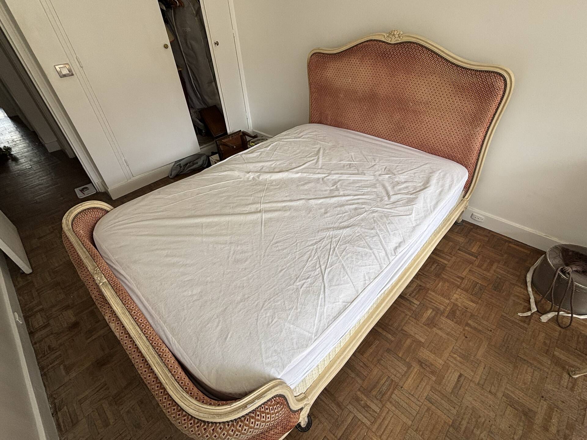 Elegant Louis XV style upholstered bed, patinated wood, house spirit of f