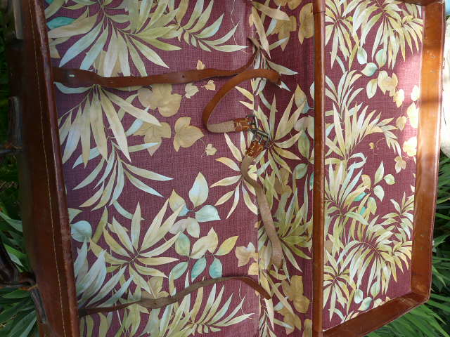 Old monogrammed leather travel suitcase and barony crown