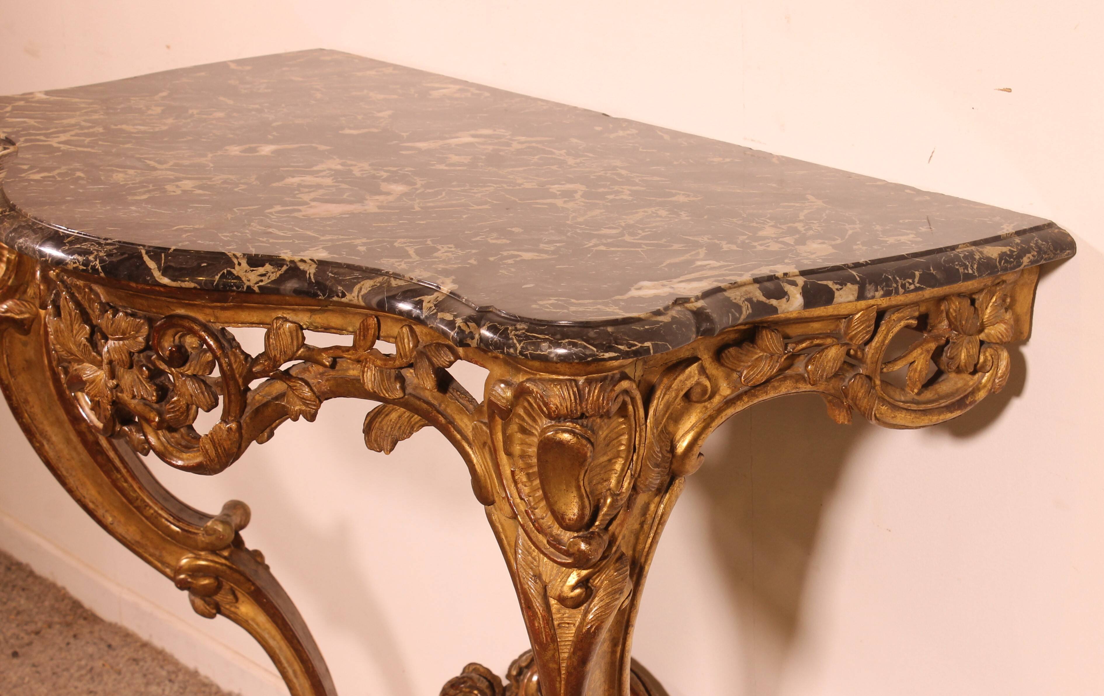 Louis XV period console in gilded wood