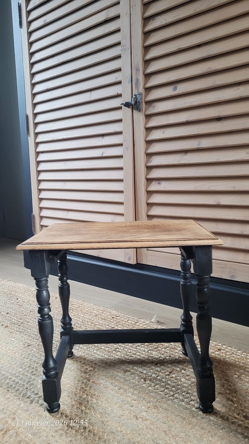Nest tables in wood and black.