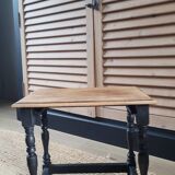 Nest tables in wood and black.