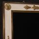 Miroir laqué et doré de style Louis XVI
