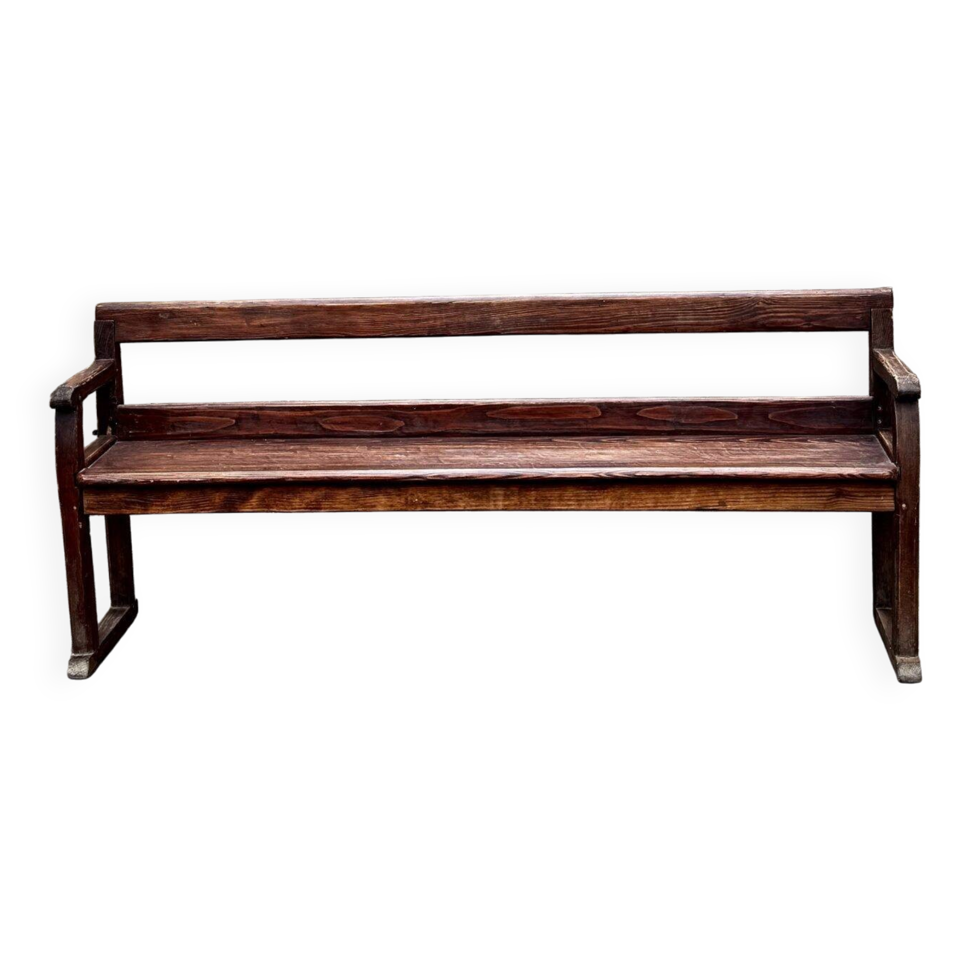 Old wooden bench with backrest and armrests