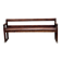 Old wooden bench with backrest and armrests