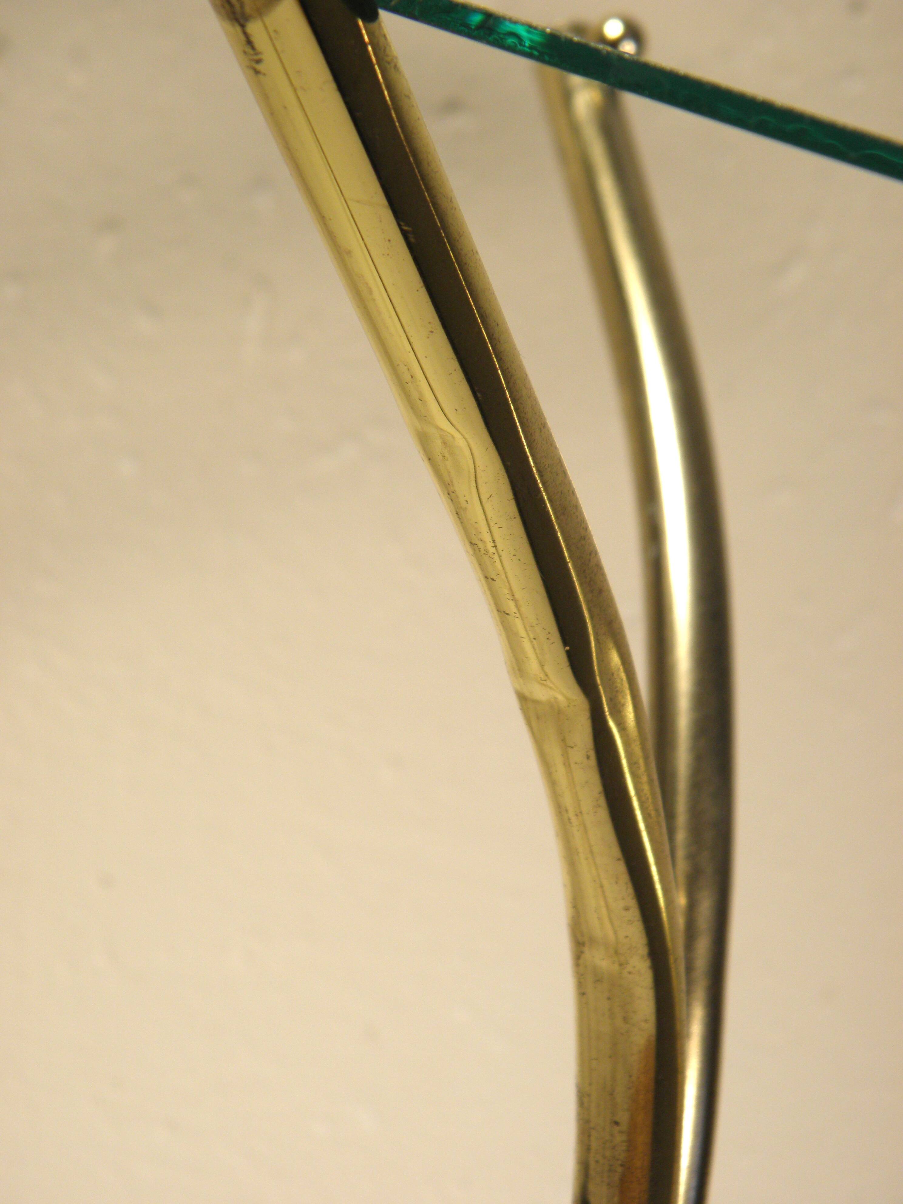 Tripod stand in gold metal and glass