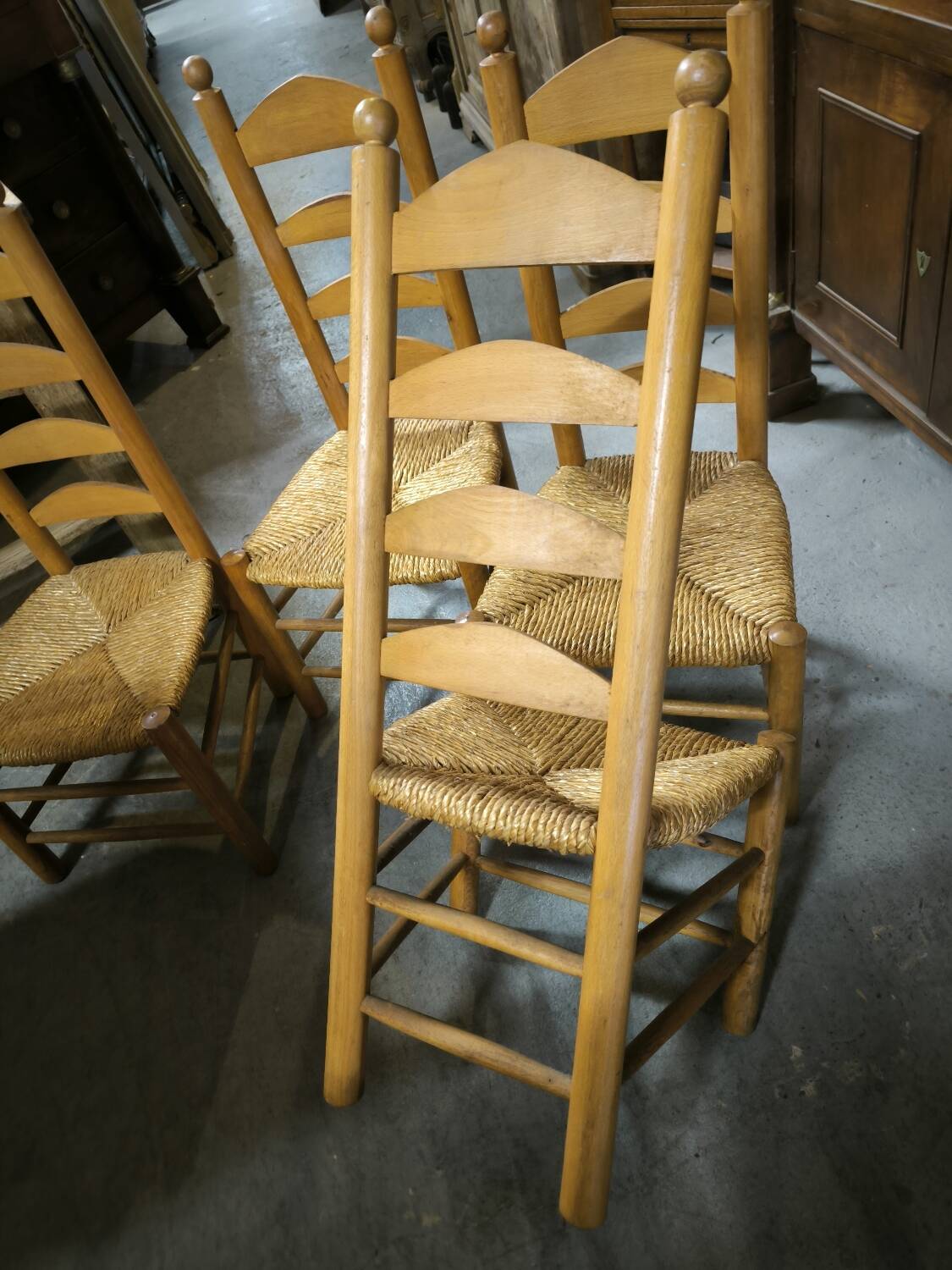 Set of 4 low straw-seated chairs circa 1940
