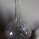 Glass carafe with round neck and fluted bellies