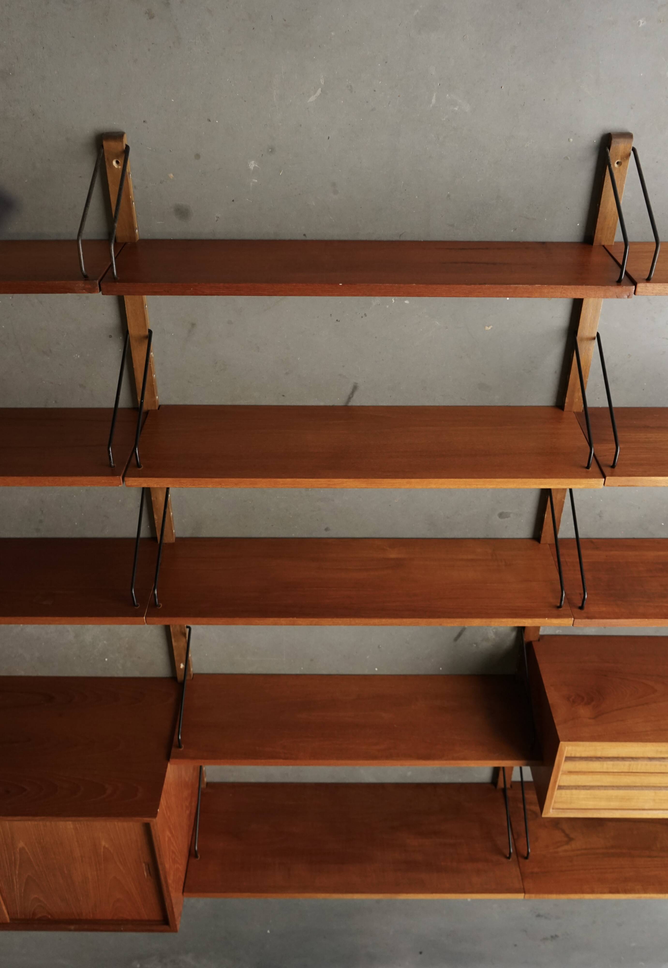 Meuble mural en teck danois du milieu du siècle par Poul Cadovius pour Cado