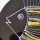 Black faience plate with stylised fish, Ty Breiz spirit from the 1960s.