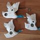 Série de 3 canards en vol en faience allemande - marque au dos