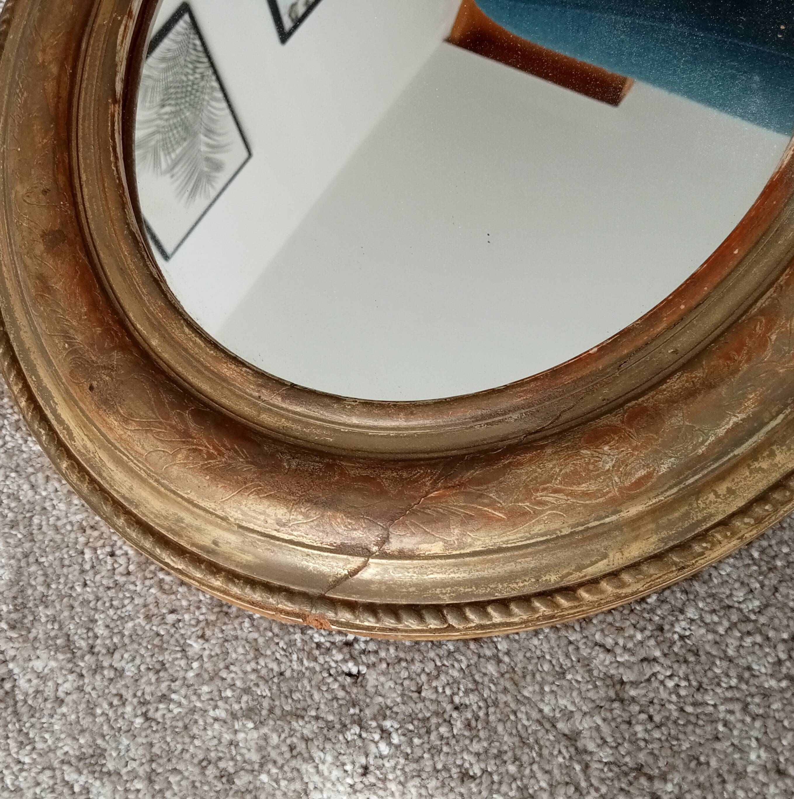 Louis Philippe 19th century oval gilded mirror in wood and stucco